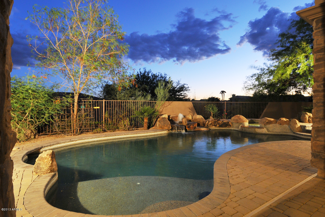 12827 East Cibola Road Scottsdale, AZ 85259 - Photo 48 of 64 a view of a lake with a house
