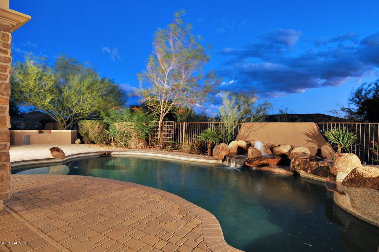12827 East Cibola Road Scottsdale, AZ 85259 - Photo 49 of 64 a view of a lake with couches chairs