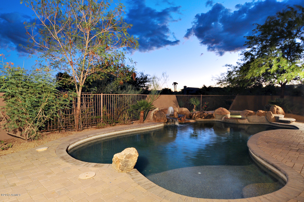 12827 East Cibola Road Scottsdale, AZ 85259 - Photo 50 of 64 a view of a swimming pool with a lake view