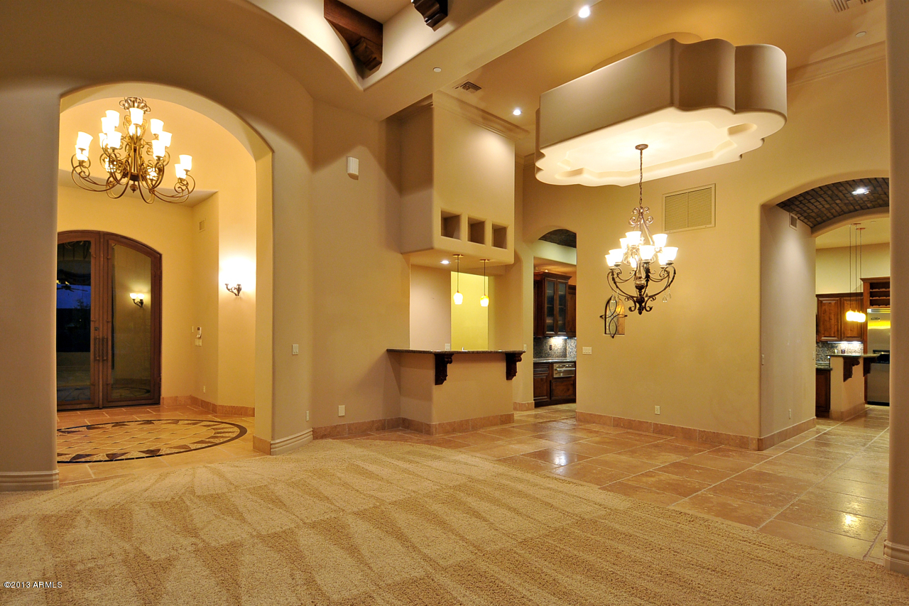 12827 East Cibola Road Scottsdale, AZ 85259 - Photo 5 of 64 a view of a livingroom with furniture and chandelier