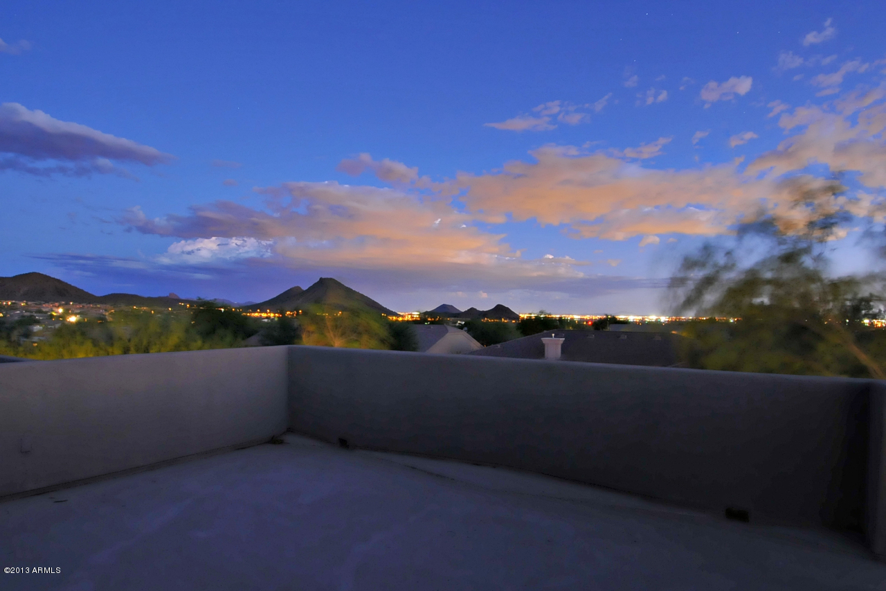 12827 East Cibola Road Scottsdale, AZ 85259 - Photo 61 of 64 a view of an lake with a yard