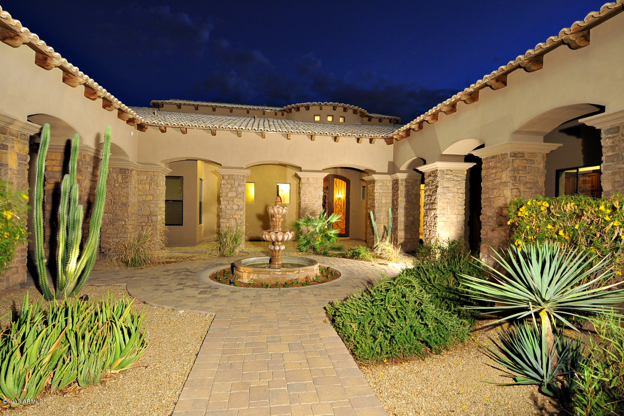 12827 East Cibola Road Scottsdale, AZ 85259 - Photo 64 of 64 a front view of a house with garden