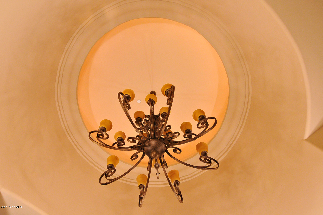 12827 East Cibola Road Scottsdale, AZ 85259 - Photo 7 of 64 a view of a swimming pool with a potted plant