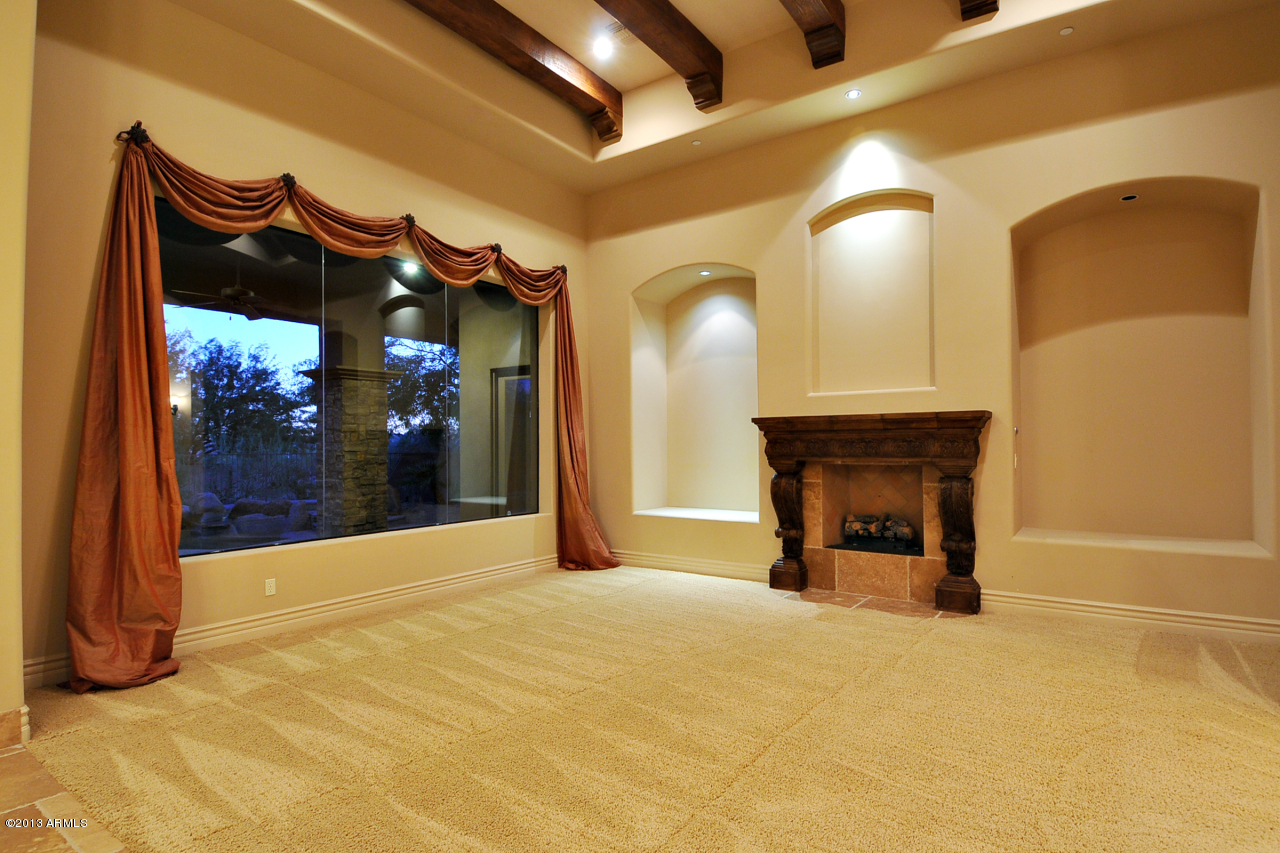 12827 East Cibola Road Scottsdale, AZ 85259 - Photo 9 of 64 a view of a fireplace in a room