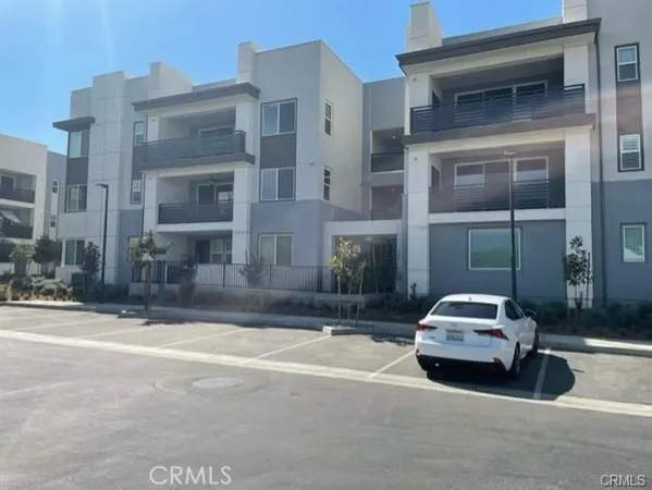 a car parked in front of a building
