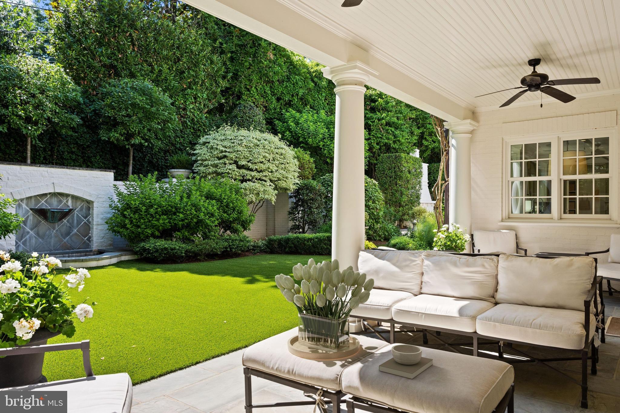 1726 Hoban Road Northwest Washington, DC 20007 - Photo 16 of 39 a view of a patio with couches table and chairs and potted plants