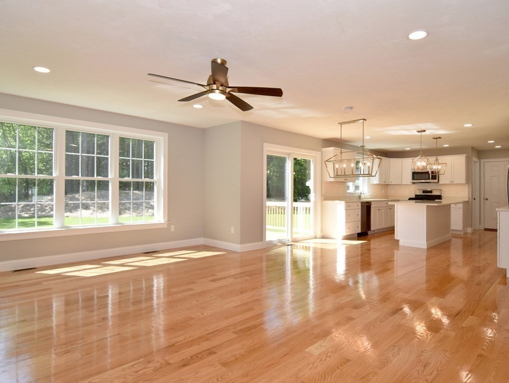 881 Maple Street Mansfield, MA 02048 - Photo 14 of 34 a view of an empty room with wooden floor and a window