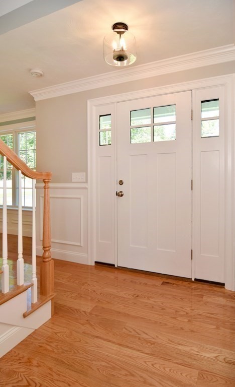 881 Maple Street Mansfield, MA 02048 - Photo 18 of 34 a view of an empty room with wooden floor and a window