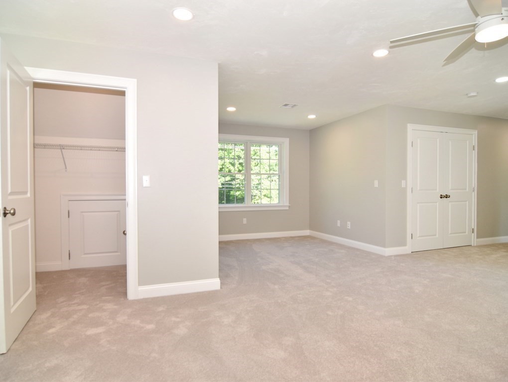 881 Maple Street Mansfield, MA 02048 - Photo 20 of 34 an empty room with windows and closet