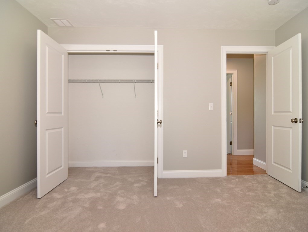 881 Maple Street Mansfield, MA 02048 - Photo 22 of 34 an empty room with closet