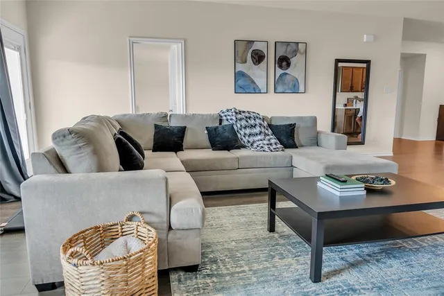 a bedroom with a bed and a television