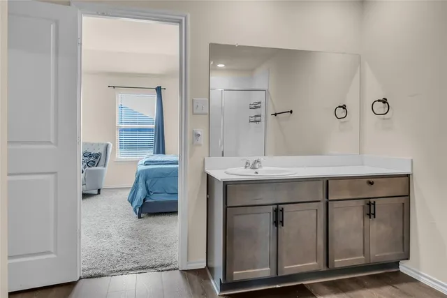 a bathroom with a toilet and a sink