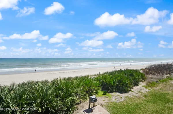 a view of a lake with beach