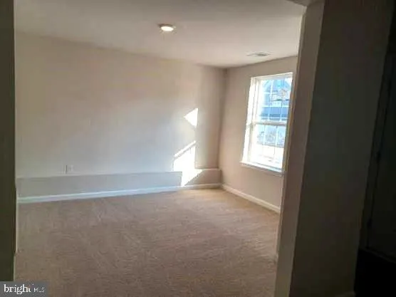 a view of empty room with window