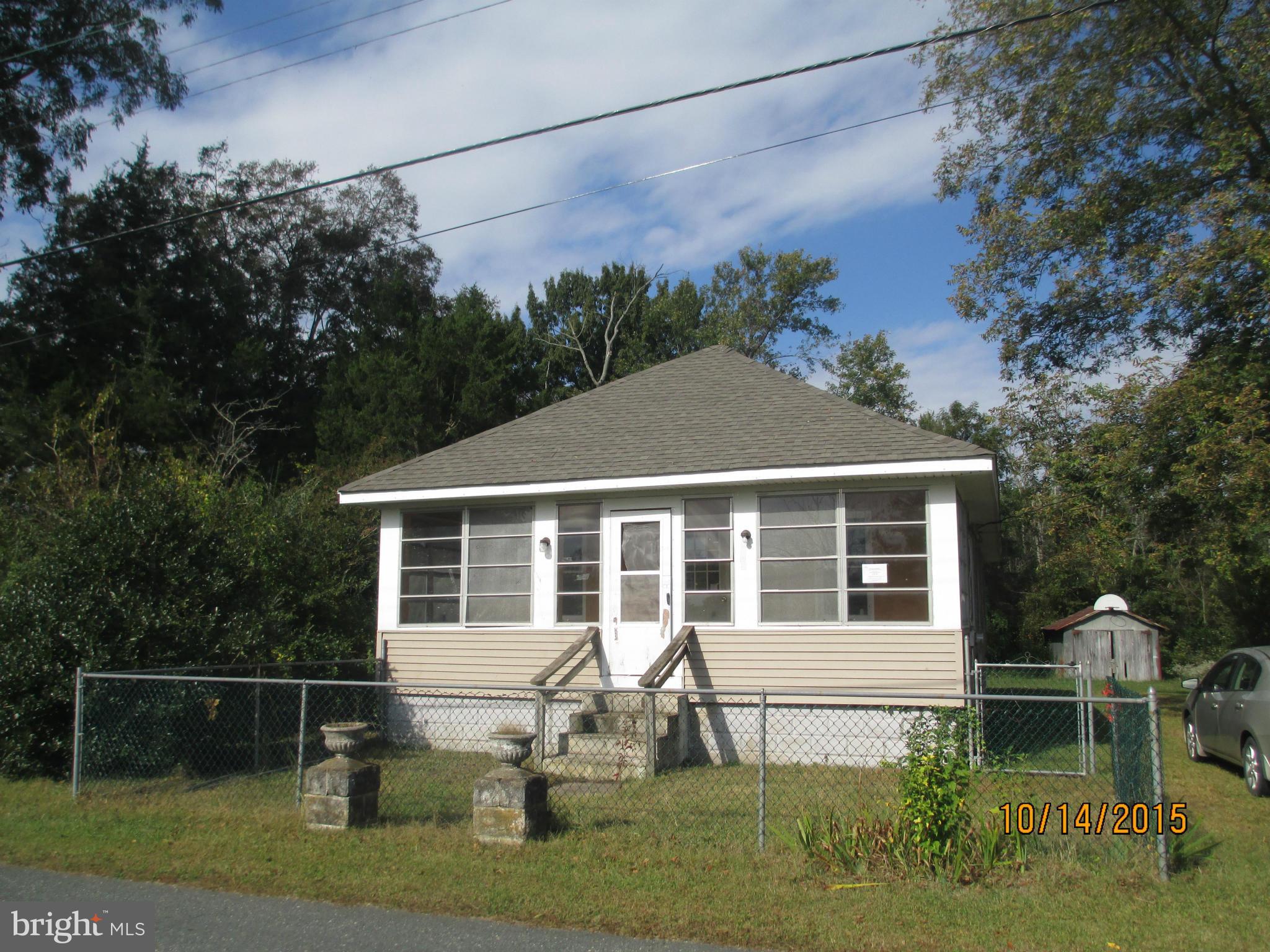 5508 Galestown Road Rhodesdale, MD 21659 - Photo 1 of 6 a front view of a house with garden