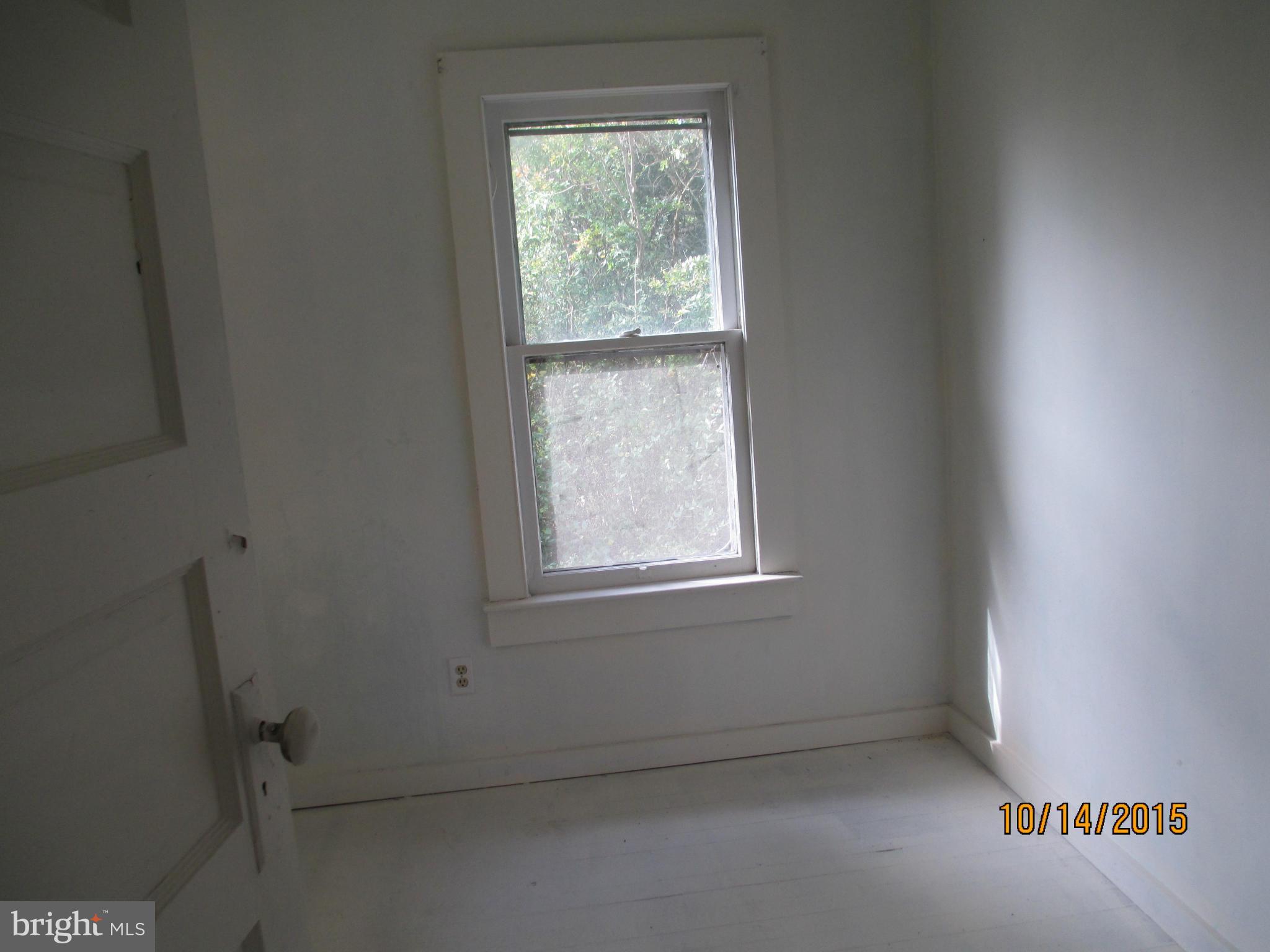 5508 Galestown Road Rhodesdale, MD 21659 - Photo 4 of 6 an empty room with a window