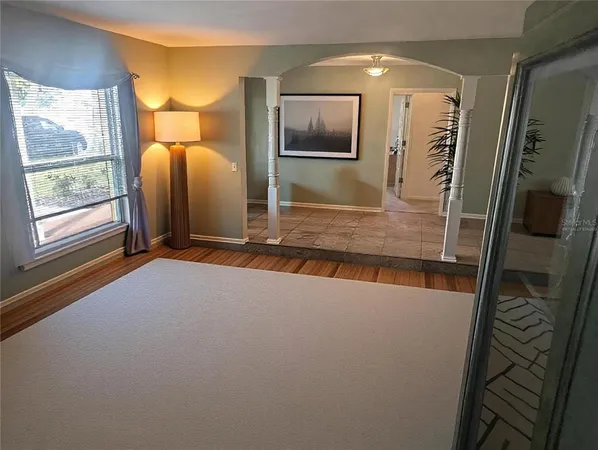 a living room with a couch and a flat screen tv