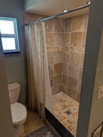 a view of a storage and utility room in a kitchen