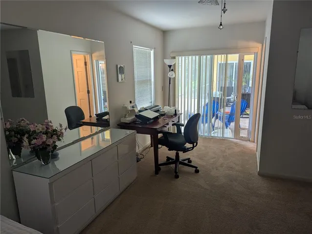 a bathroom with a double vanity sink mirror and toilet