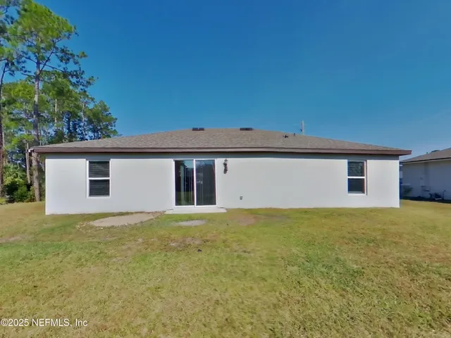 a view of a house with a outdoor space