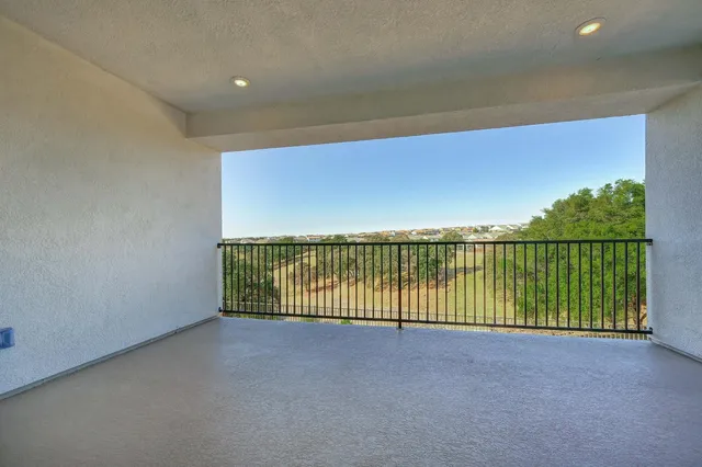 a view of a building from a balcony