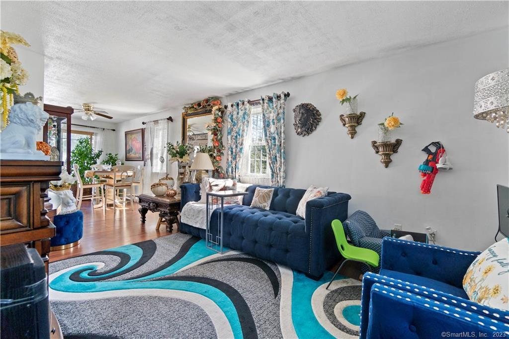 a living room with furniture and a table