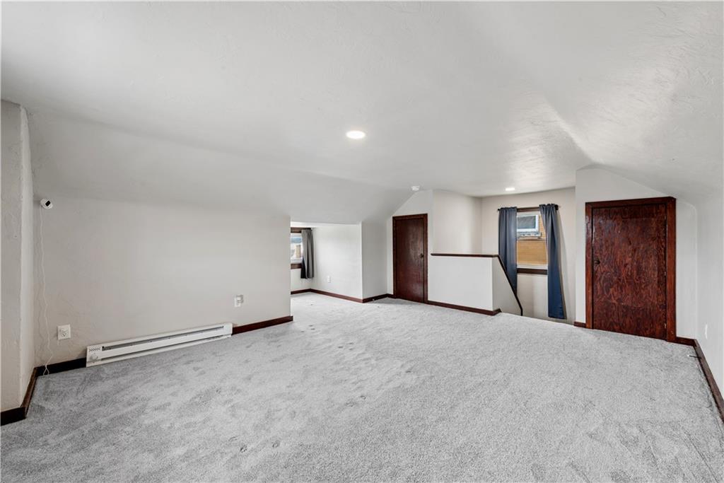 53 Calhoun Avenue Pittsburgh, PA 15210 - Photo 19 of 30 an empty room with closet and mirror