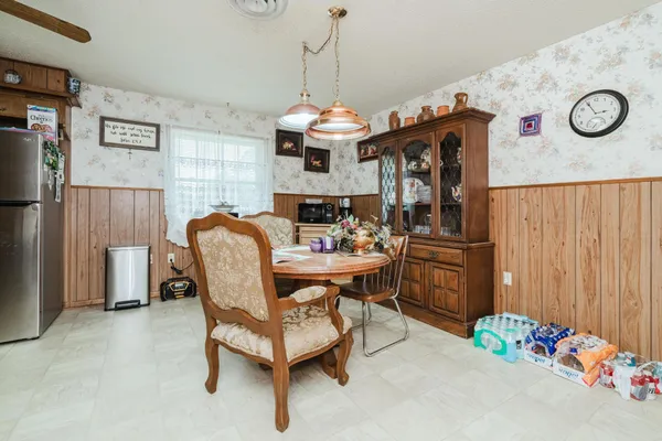 a dining room with furniture and a table