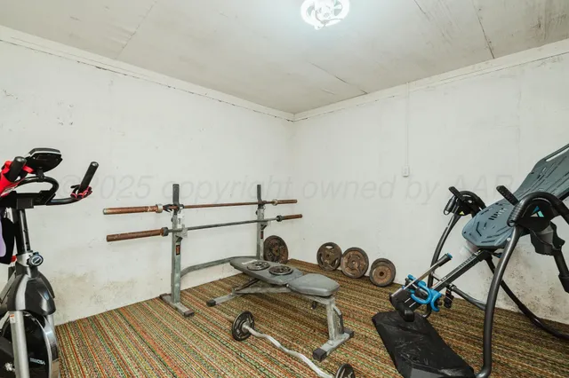 a view of a workspace with furniture