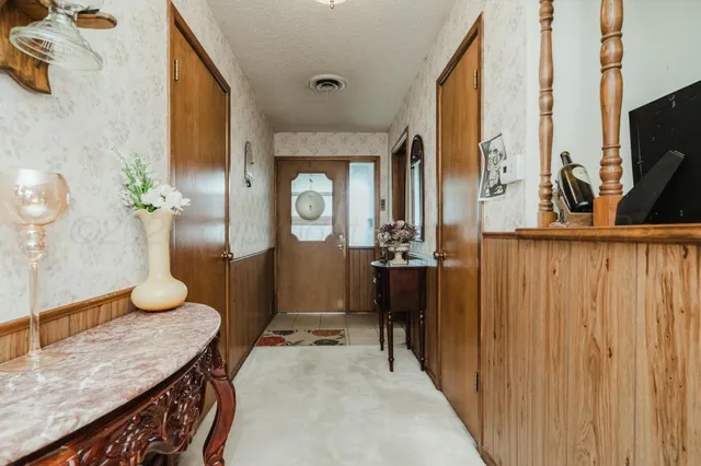 a view of a living room and bathroom