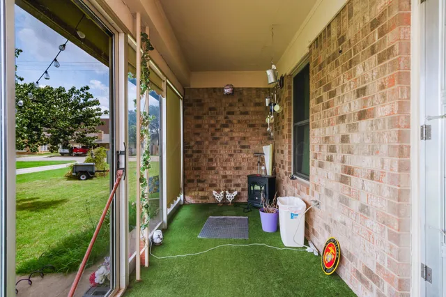 a balcony view with a garden space