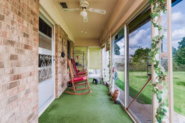 a view of an entryway with a backyard