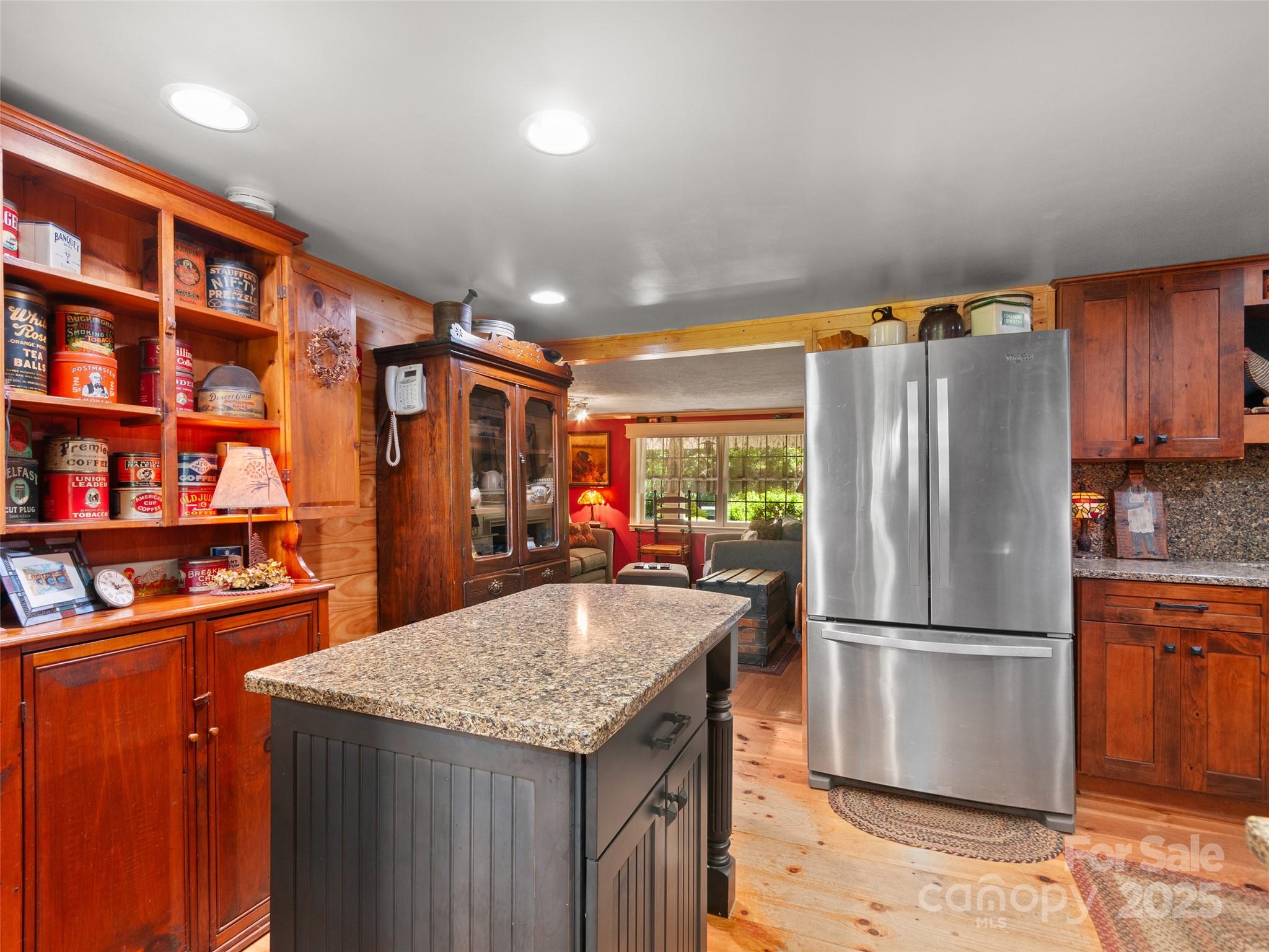 229 Crabtree Mountain Road Canton, NC 28716 - Photo 16 of 42 a kitchen with stainless steel appliances granite countertop a refrigerator a sink and a stove