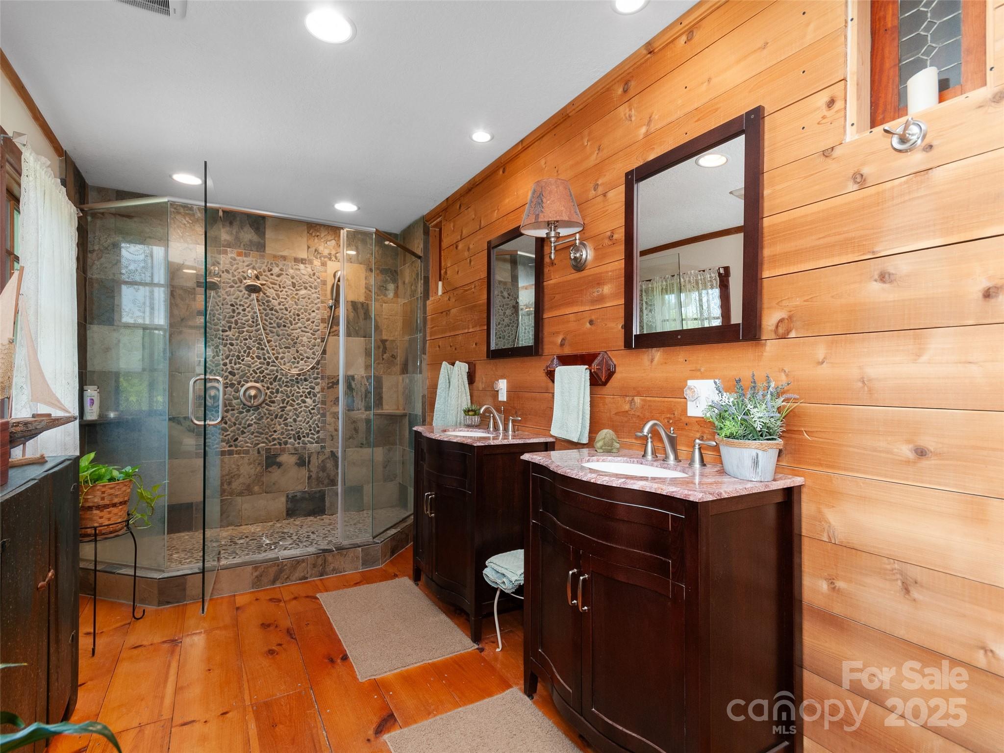 229 Crabtree Mountain Road Canton, NC 28716 - Photo 28 of 42 a bathroom with a sink and a mirror