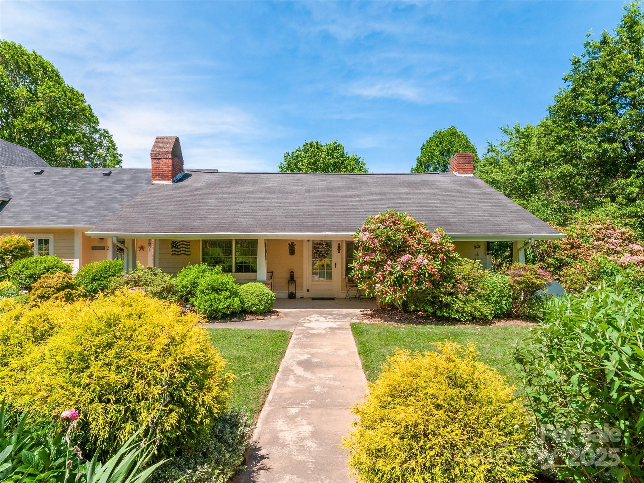 229 Crabtree Mountain Road Canton, NC 28716 - Photo 3 of 42 a front view of house with yard and green space