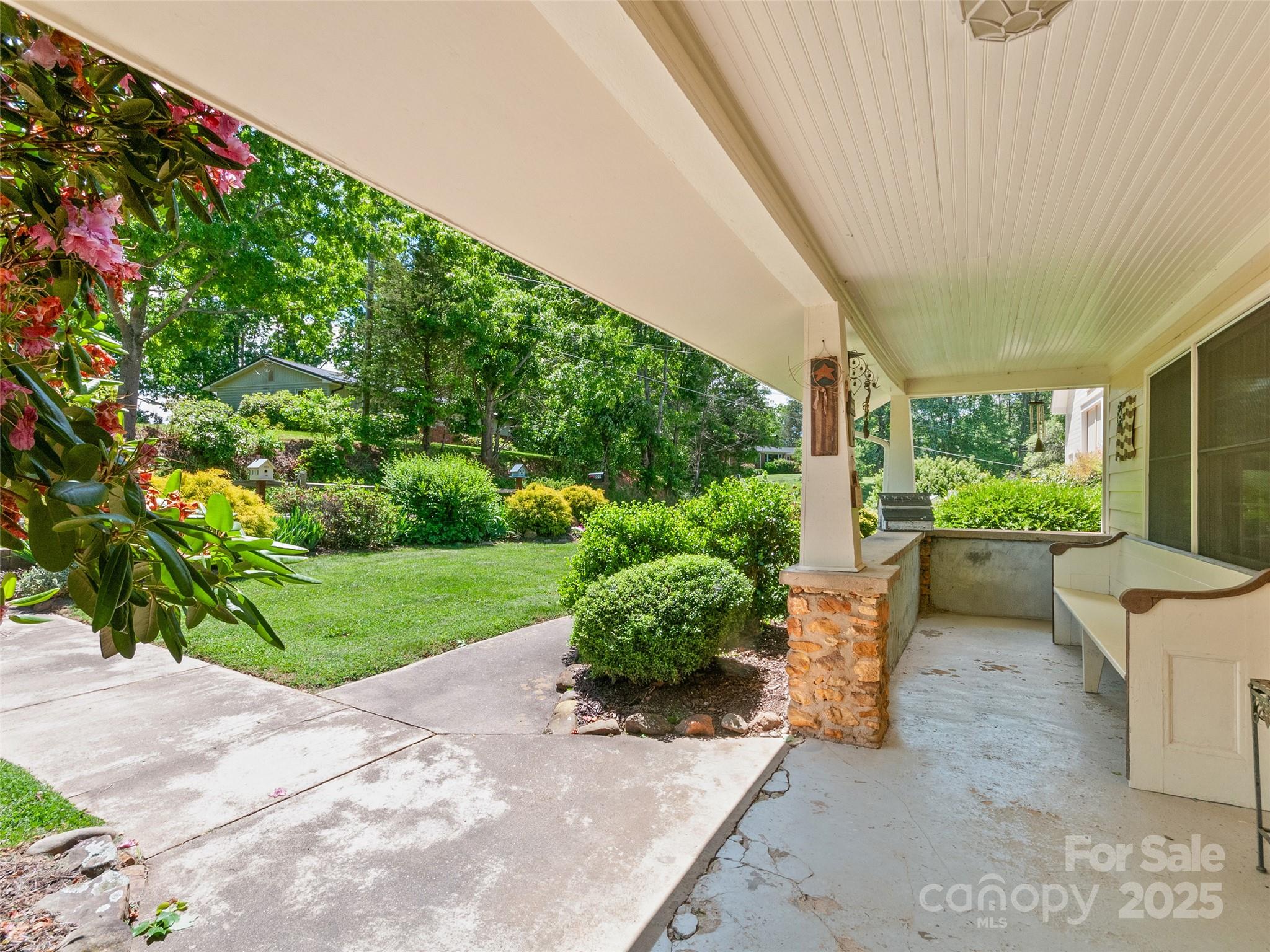 229 Crabtree Mountain Road Canton, NC 28716 - Photo 5 of 42 a house view with a garden space