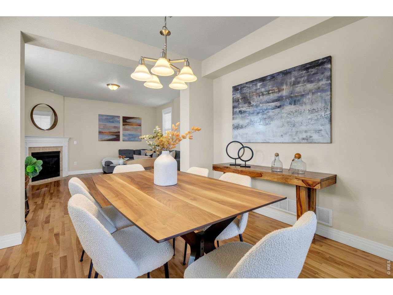 696 Homestead Street Lafayette, CO 80026 - Photo 11 of 49 a view of a dining room with furniture and wooden floor
