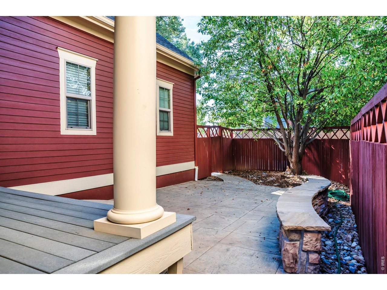 696 Homestead Street Lafayette, CO 80026 - Photo 22 of 49 a backyard of a house with seating space