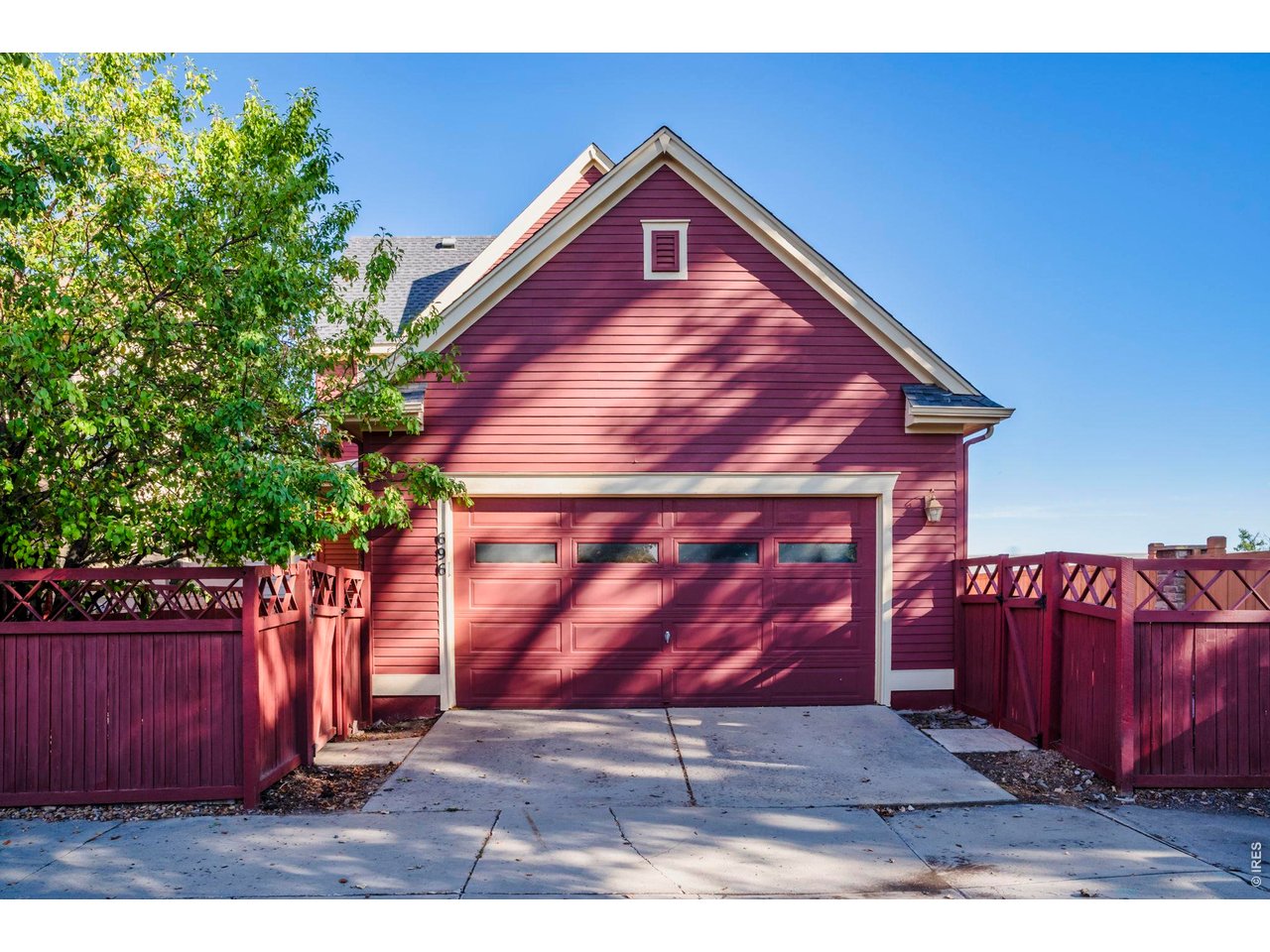 696 Homestead Street Lafayette, CO 80026 - Photo 23 of 49 a front view of a house with garden