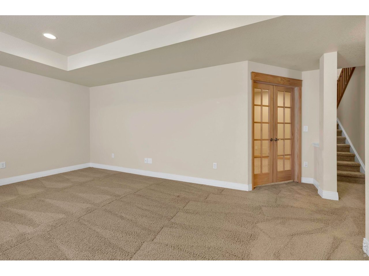696 Homestead Street Lafayette, CO 80026 - Photo 35 of 49 a view of an empty room with a window