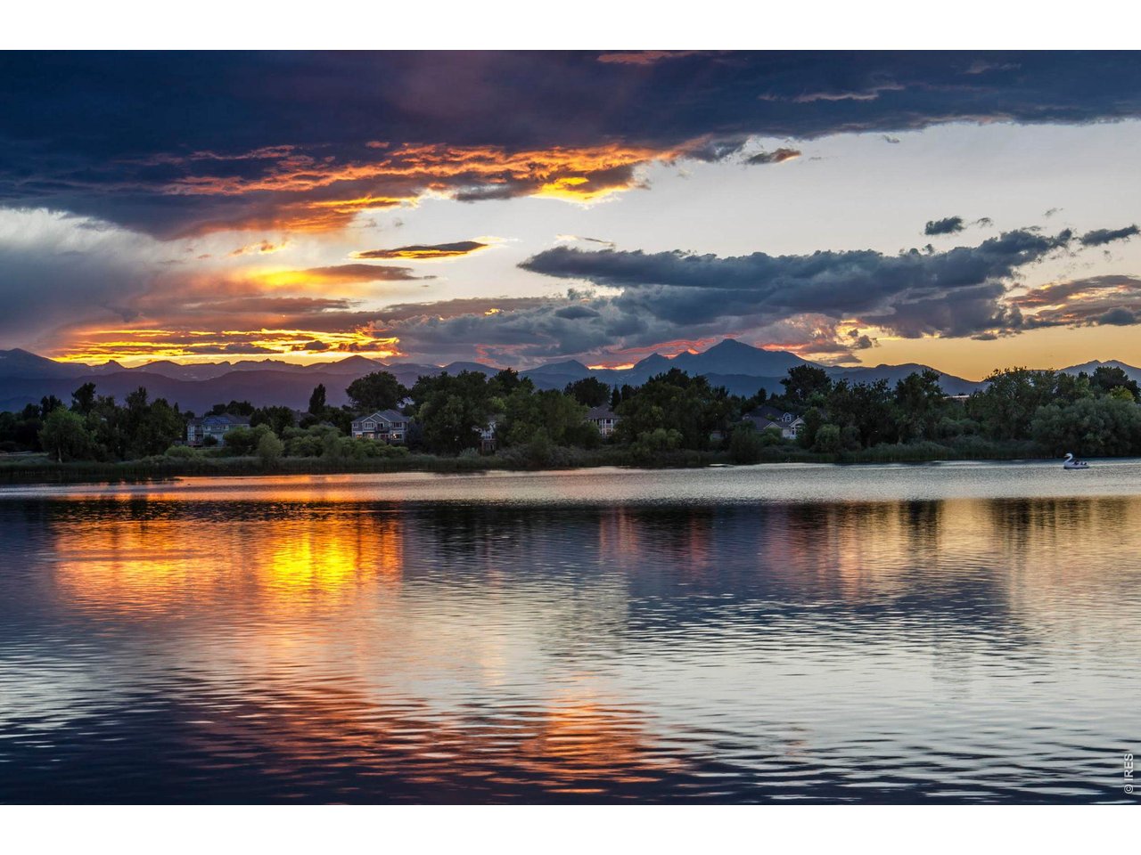 696 Homestead Street Lafayette, CO 80026 - Photo 45 of 49 a view of an ocean with city from a lake
