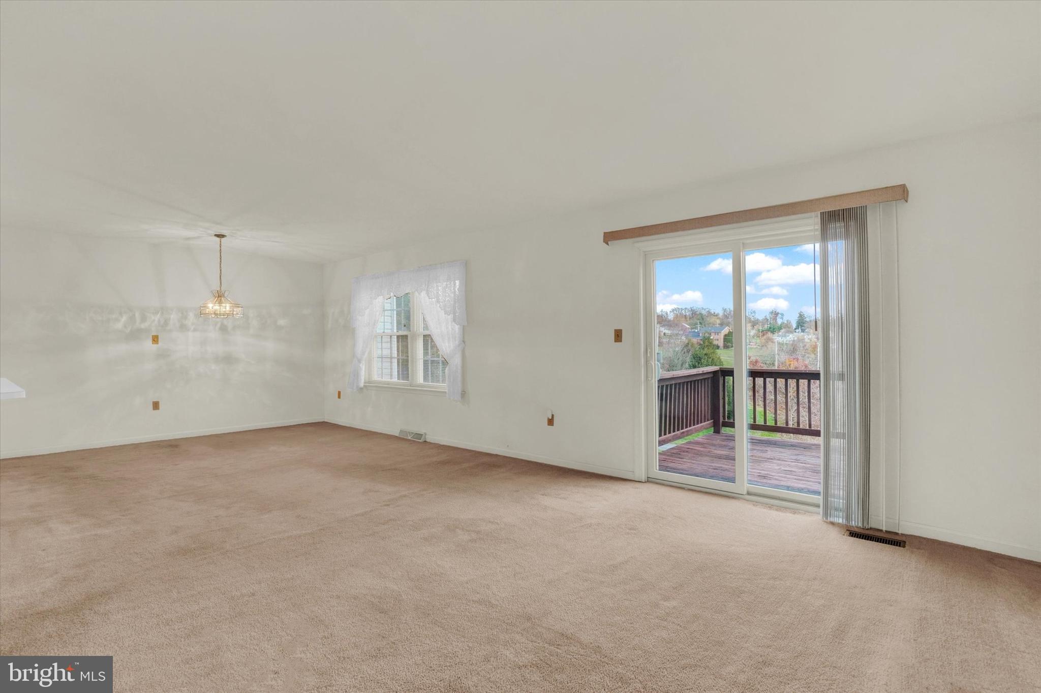 113 Country Ridge Drive Red Lion, PA 17356 - Photo 11 of 27 Living room w/ access to Deck