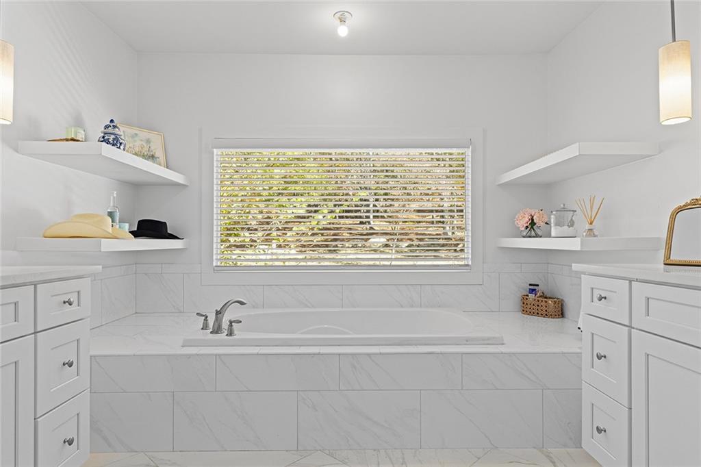 12005 Hamilton Road Chattahoochee Hills, GA 30268 - Photo 23 of 51 a bathroom with a sink and a window