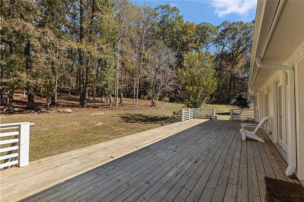 12005 Hamilton Road Chattahoochee Hills, GA 30268 - Photo 39 of 51 a view of a yard with wooden floor
