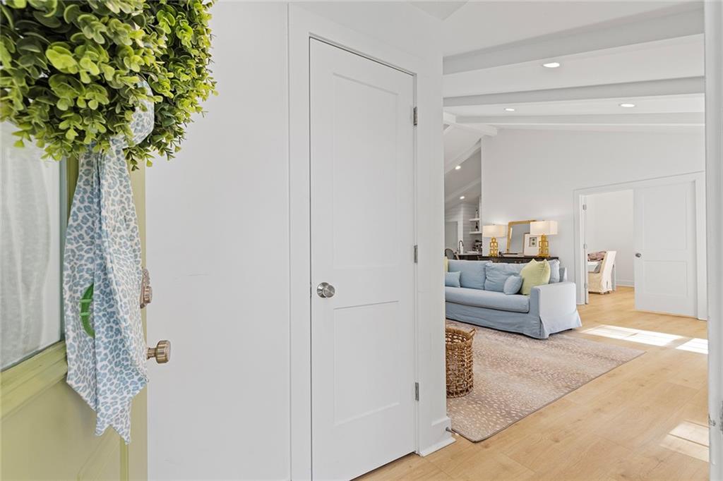 12005 Hamilton Road Chattahoochee Hills, GA 30268 - Photo 4 of 51 a living room with furniture and a potted plant