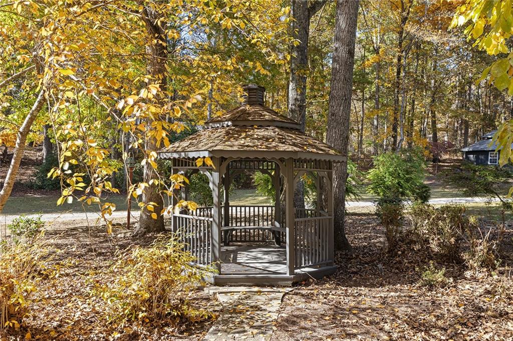 12005 Hamilton Road Chattahoochee Hills, GA 30268 - Photo 50 of 51 a view of a entrance gate of the house