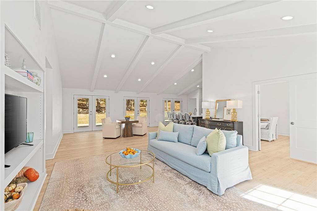 12005 Hamilton Road Chattahoochee Hills, GA 30268 - Photo 5 of 51 a living room with furniture and a table