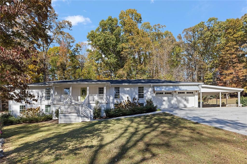 12005 Hamilton Road Chattahoochee Hills, GA 30268 - Photo 51 of 51 front view of a house with a patio