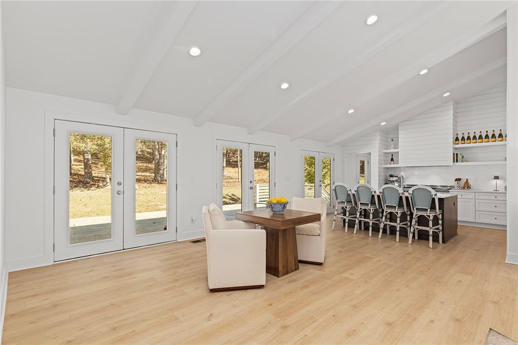 12005 Hamilton Road Chattahoochee Hills, GA 30268 - Photo 8 of 51 a view of a kitchen with furniture and living room