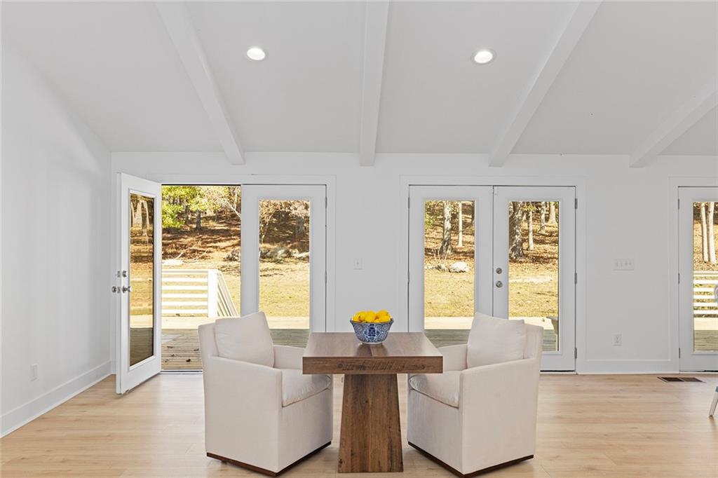 12005 Hamilton Road Chattahoochee Hills, GA 30268 - Photo 9 of 51 a living room with furniture and a large window